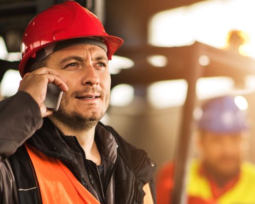 Worker in orange jacket